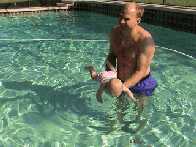 I am swimming with only a little help from pappa...