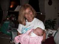 Grandma holding me....